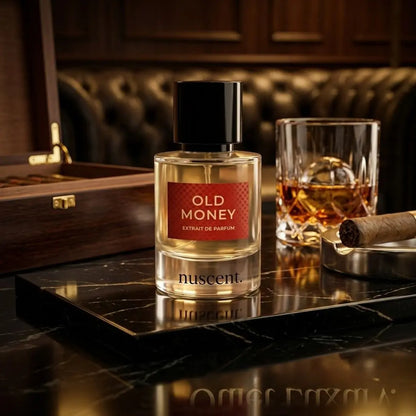 Old Money nuscent fragrance on black marble with whiskey glass and cigar in a luxury leather study setting — warm amber fragrance for boardroom evenings