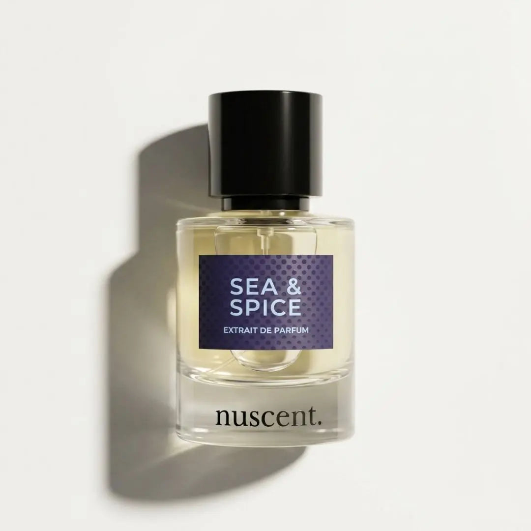Sea & Spice eau de parfum by nuscent – citrus and marine fragrance with dark navy label and black cap