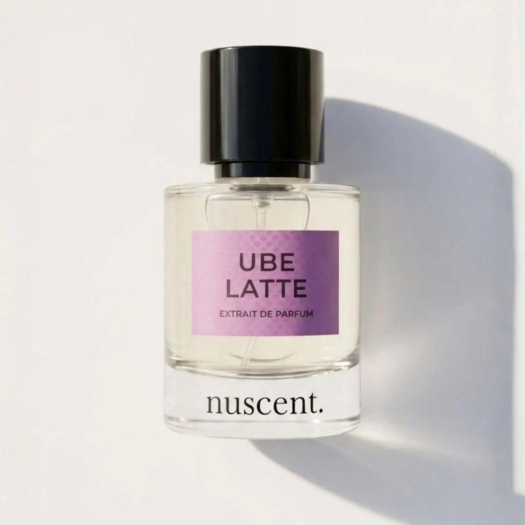 Ube Latte eau de parfum by nuscent – creamy gourmand fragrance with soft pink and purple label and black cap